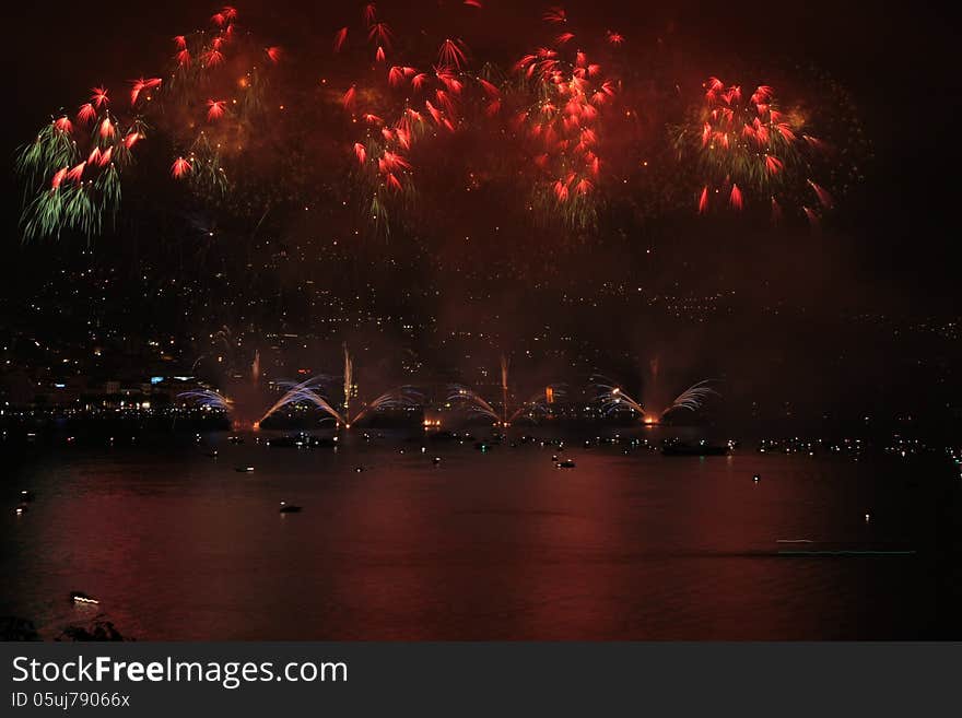 Fireworks show on the shore of the Lake of Lugano (Italian Switzerland)