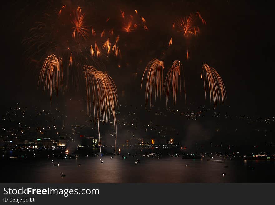 Fireworks show on the shore of the Lake of Lugano (Italian Switzerland)