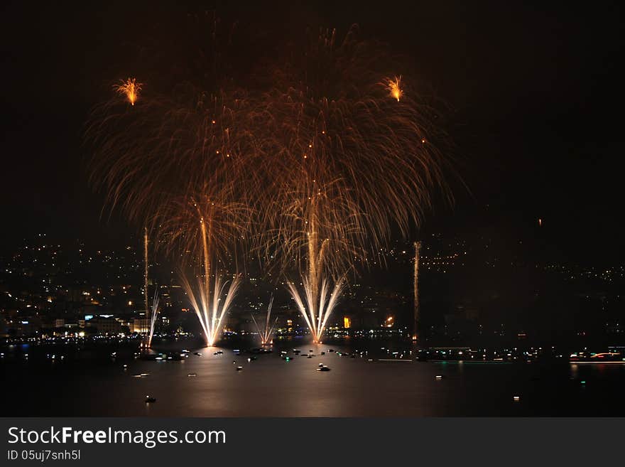 Fireworks show on the shore of the Lake of Lugano (Italian Switzerland)