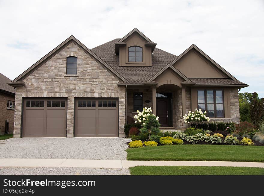 Stucco stone house with pretty garden and grass version 2. Stucco stone house with pretty garden and grass version 2.