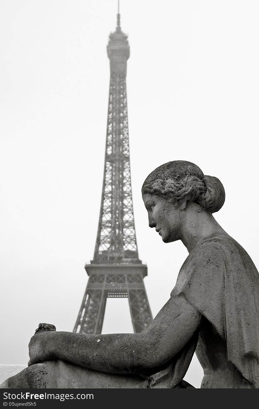 Old Statue With Eiffel Tower In The Background In Paris, France,