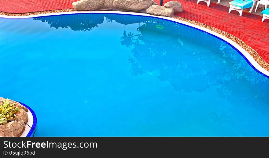 Luxury Resort Swimming Pool high angle on curved edge of a luxury resort swimming pool