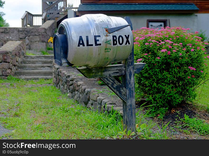 A unique and humorous mailbox made from converted beer keg. The picture was taken at Barley Creek Brewing Company, Tannersville PA. A unique and humorous mailbox made from converted beer keg. The picture was taken at Barley Creek Brewing Company, Tannersville PA.