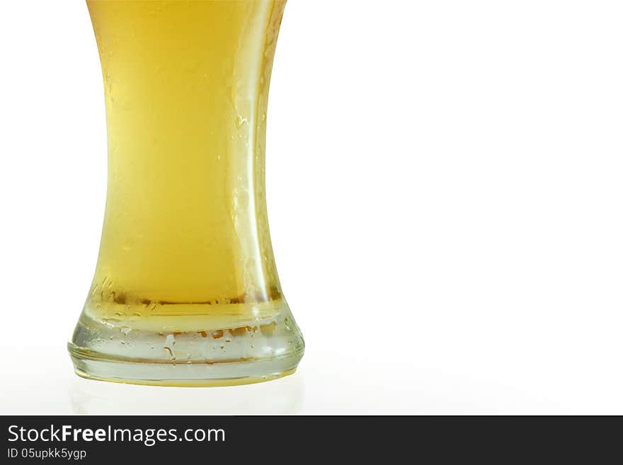 Frosty glass of light beer isolated on a white background. Frosty glass of light beer isolated on a white background