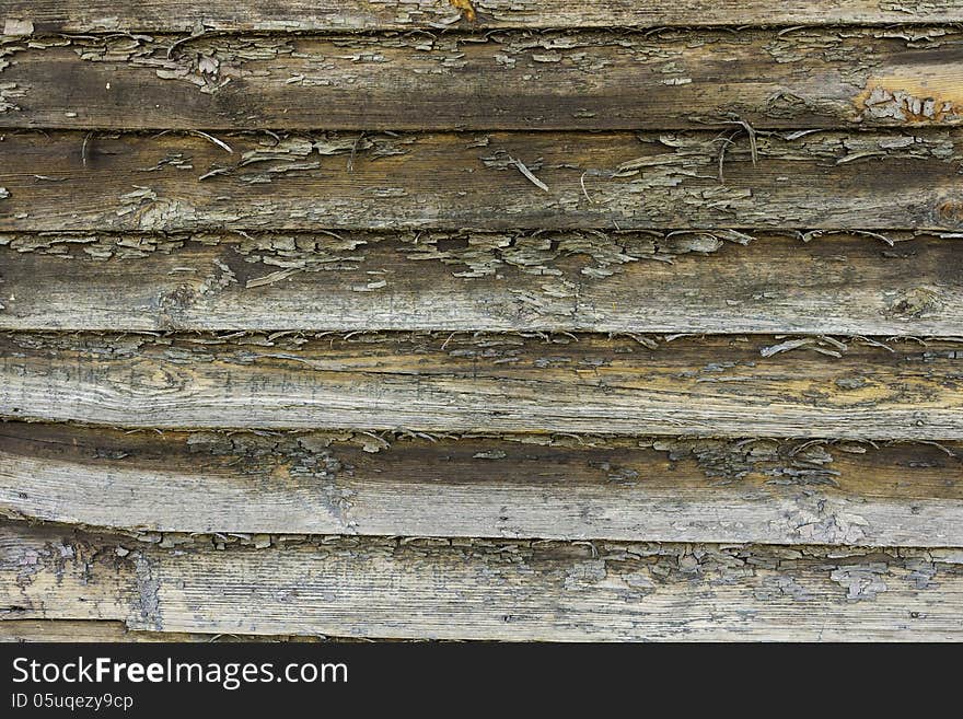 Old wooden wall peeling off paint distressed texture