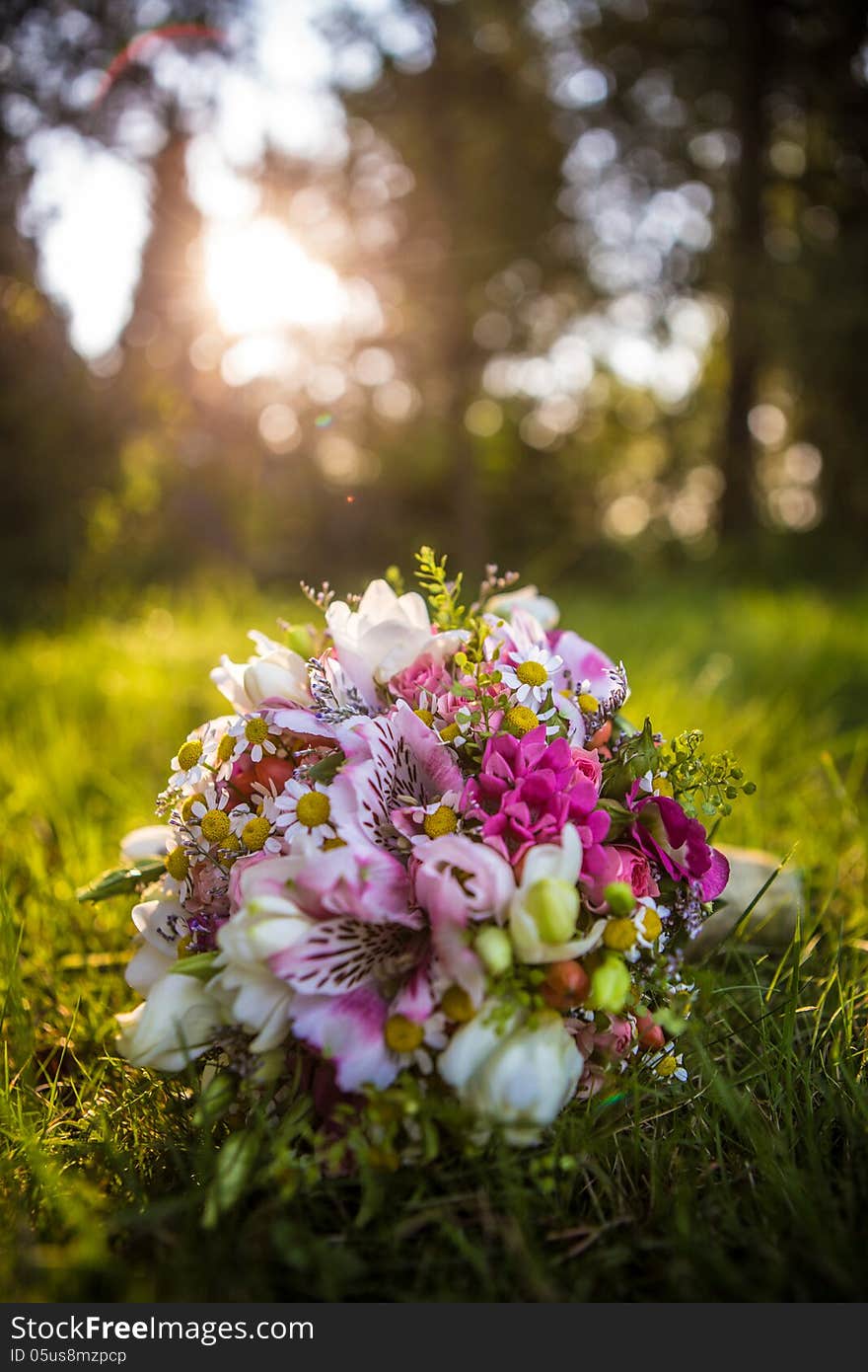 Wedding bouquet on the meadow