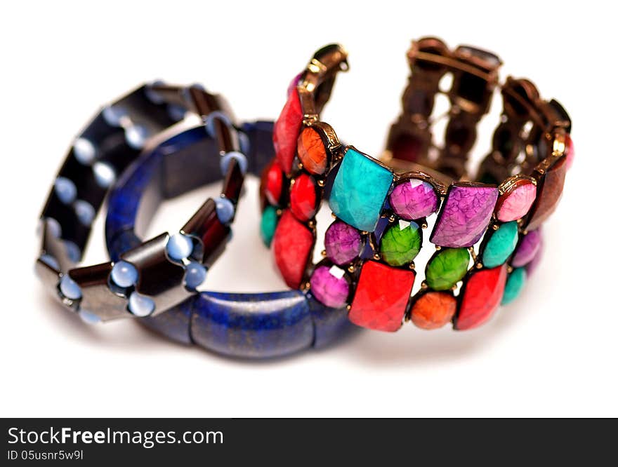 Three different bracelet on white background. Hematite Lapis Lazuli. Three different bracelet on white background. Hematite Lapis Lazuli