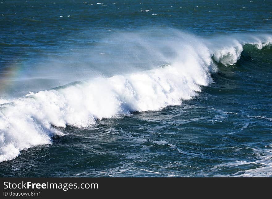 Breaking wave in Atlantic near Asilah port.