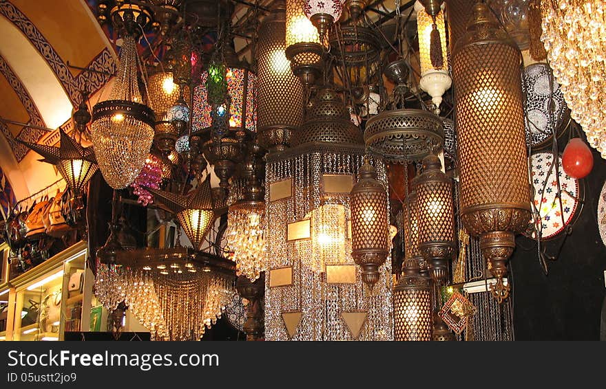 Bronze and crystal lamps in the eastern shop. Bronze and crystal lamps in the eastern shop