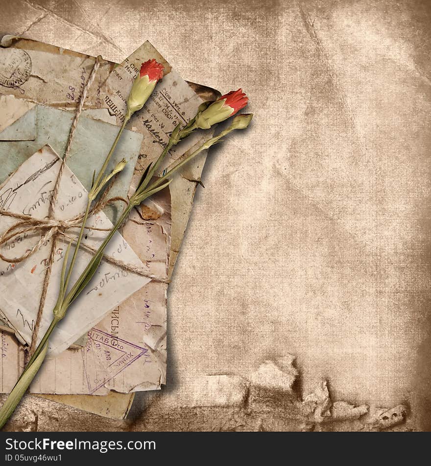 Vintage beautiful background with stack of old letters, with flowers and with space for text and photos. Vintage beautiful background with stack of old letters, with flowers and with space for text and photos