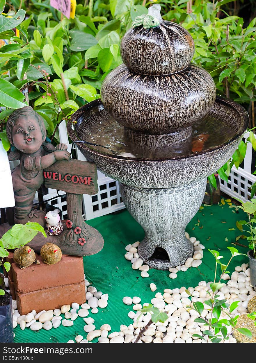 Outdoor Fountain in the Garden sunflowers