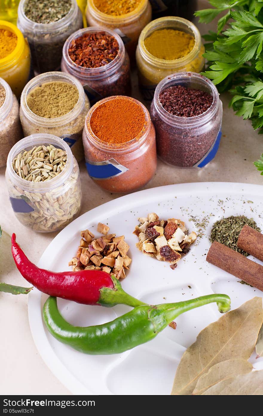 Spices and dry tea in boxes and palette