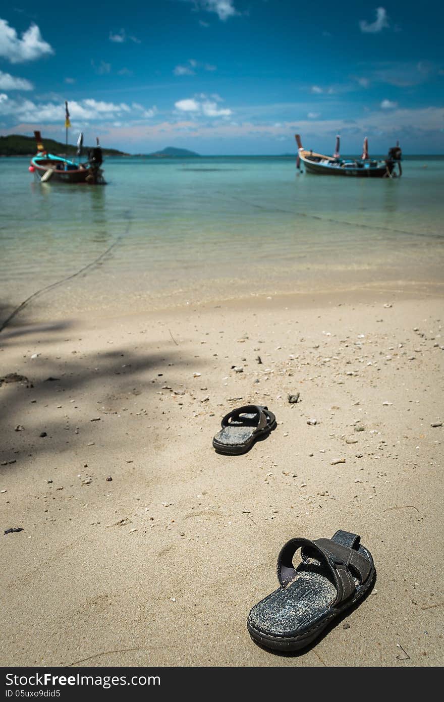 Pair of sandal on the beach