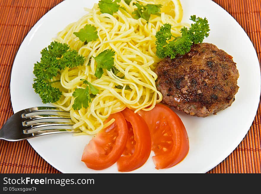 Spaghetti and burger meatball rissole