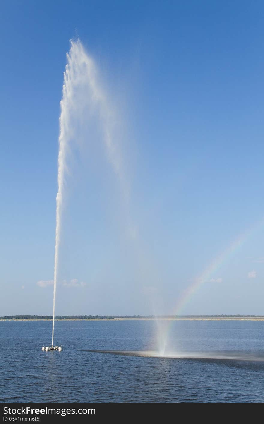 Rainbow and  fountain