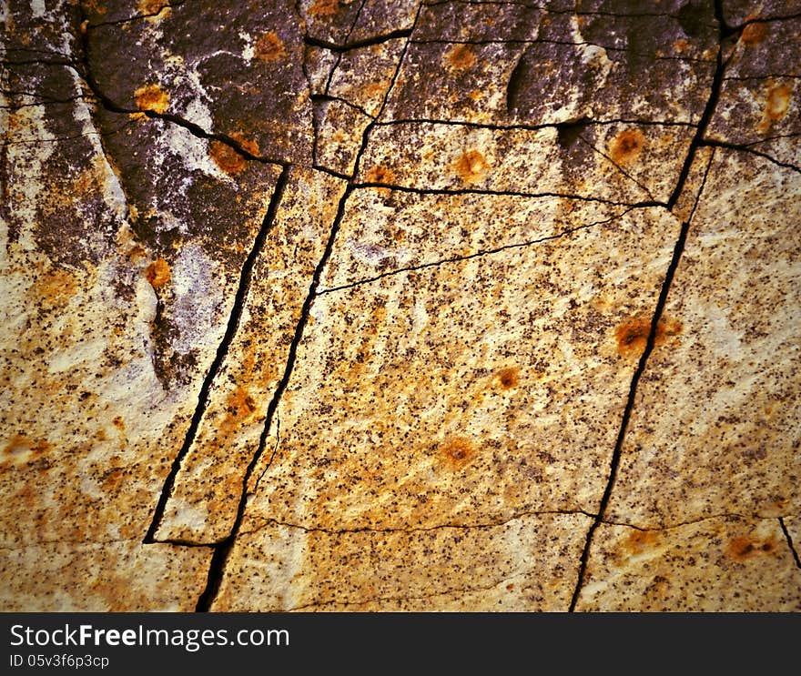 Ocher orange texture of limestone stone block. Ocher orange texture of limestone stone block