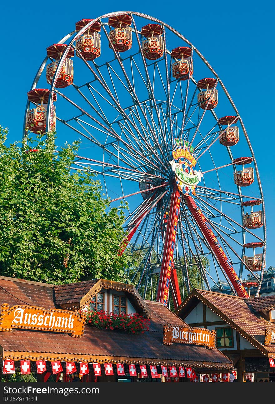 Big wheel on festival with blue sky. Big wheel on festival with blue sky