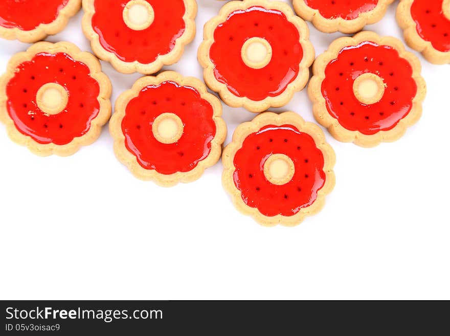 Lot of strawberry biscuits. Cllose up. White background.