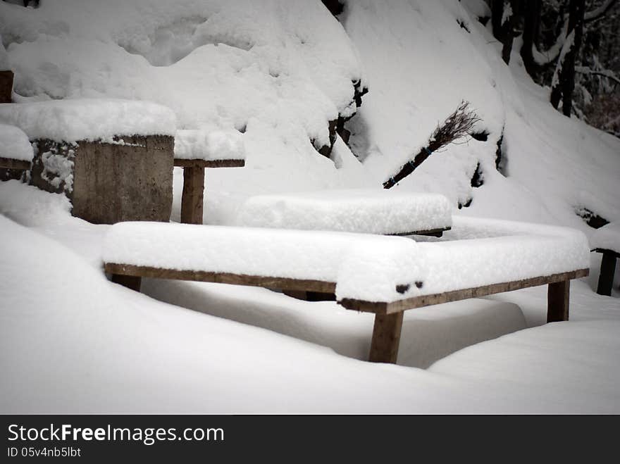 Snowy furniture in the cold winter