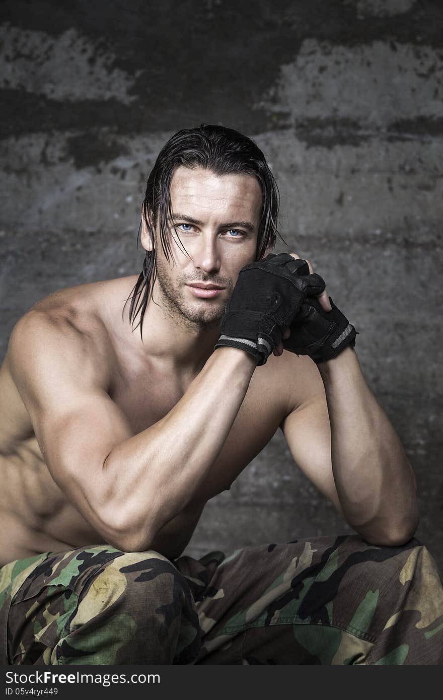 Portrait Of Handsome Athlete During His Workout Rest