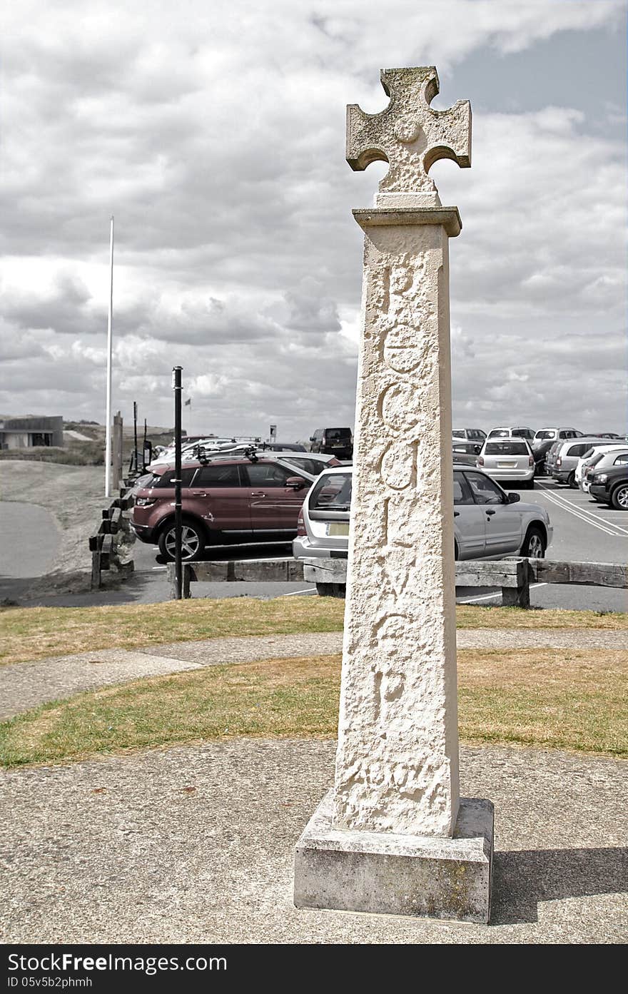 Here stands the Reculver land mark stone pillar and cross at the foot of the hill. Here stands the Reculver land mark stone pillar and cross at the foot of the hill