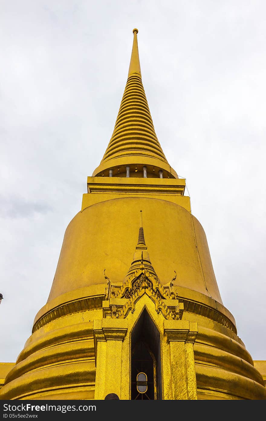 Goldplated chedi on the upper terrace of the Grand Palace in Bangkok is the eyecatcher of Bangkok's main historical tourist attraction. Goldplated chedi on the upper terrace of the Grand Palace in Bangkok is the eyecatcher of Bangkok's main historical tourist attraction.