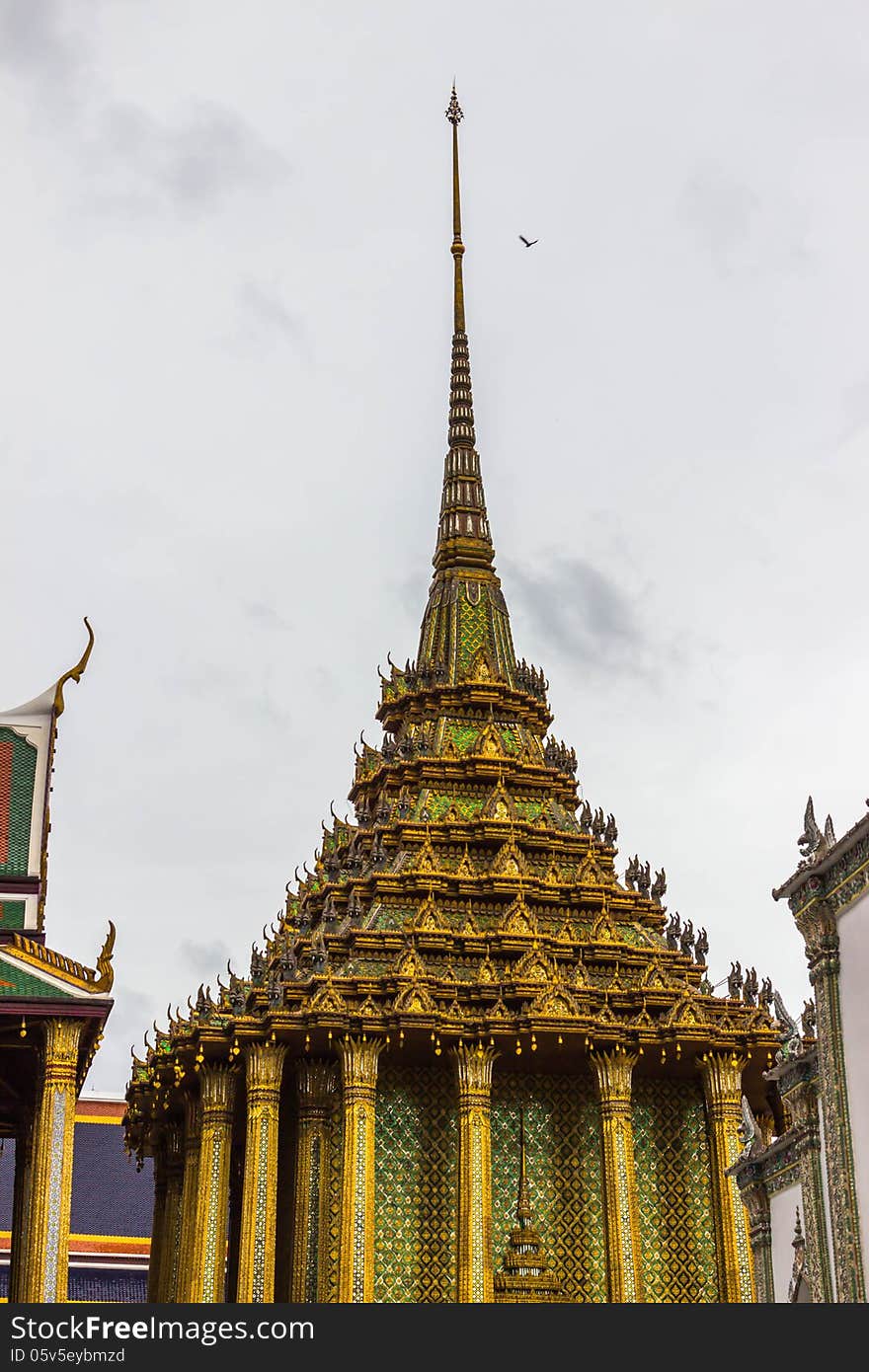 One of the many highly decorated buildings on the upper terrace of the Grand Palace in Bangkok. One of the many highly decorated buildings on the upper terrace of the Grand Palace in Bangkok.