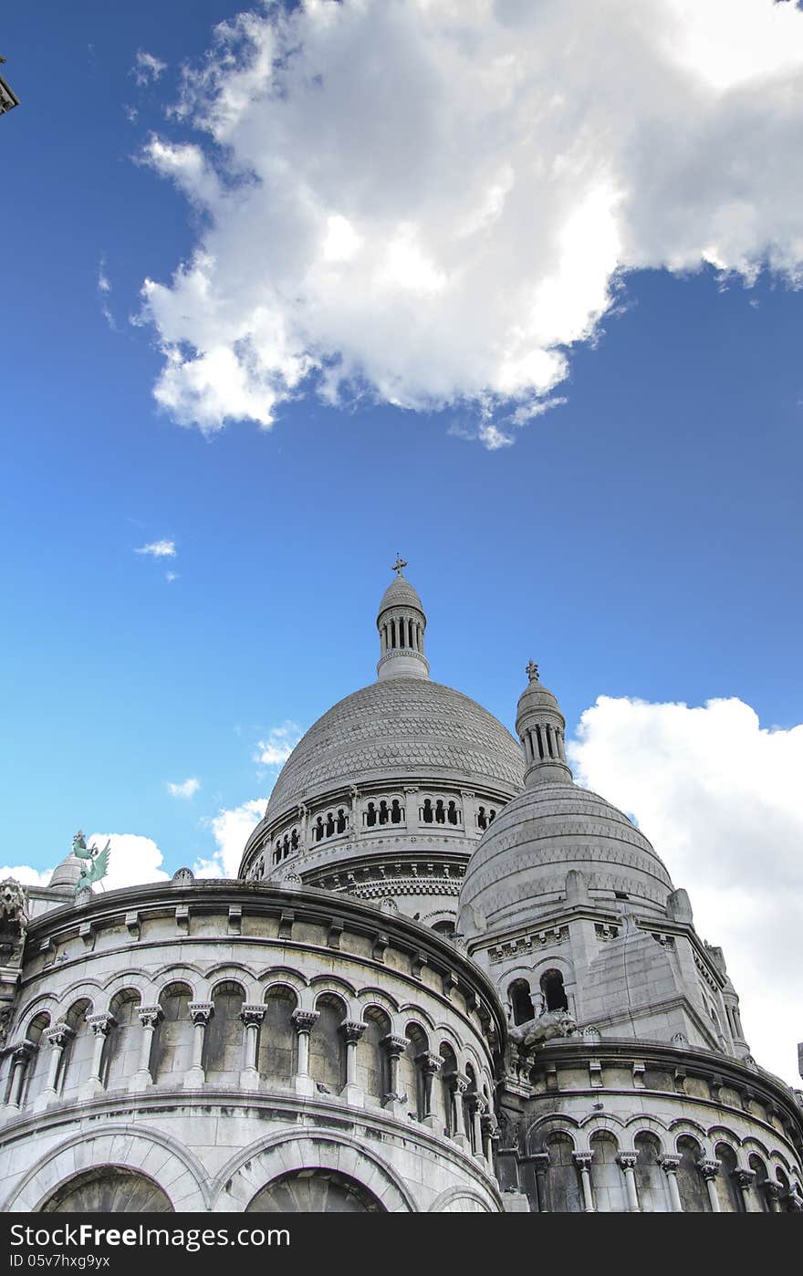 The Basilica of the Sacred Heart of Paris, commonly known as Sacré-Cœur Basilica (French: Basilique du Sacré-Cœur, pronounced, is a Roman Catholic church and minor basilica, dedicated to the Sacred Heart of Jesus, in Paris, France. A popular landmark, the basilica is located at the summit of the butte Montmartre, the highest point in the city. Sacré-Cœur is a double monument,. The Basilica of the Sacred Heart of Paris, commonly known as Sacré-Cœur Basilica (French: Basilique du Sacré-Cœur, pronounced, is a Roman Catholic church and minor basilica, dedicated to the Sacred Heart of Jesus, in Paris, France. A popular landmark, the basilica is located at the summit of the butte Montmartre, the highest point in the city. Sacré-Cœur is a double monument,