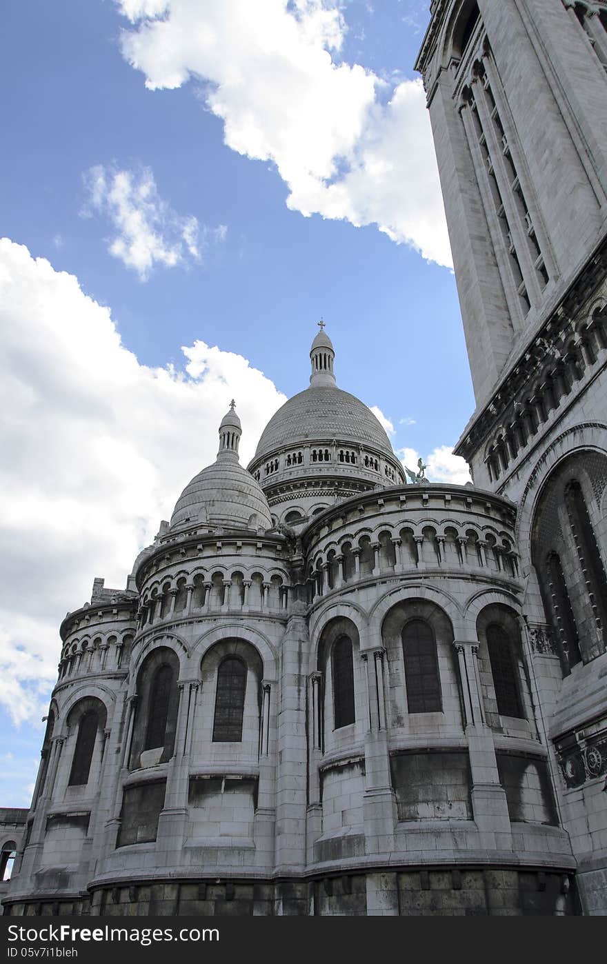 The Basilica of the Sacred Heart of Paris, commonly known as Sacré-Cœur Basilica (French: Basilique du Sacré-Cœur, pronounced, is a Roman Catholic church and minor basilica, dedicated to the Sacred Heart of Jesus, in Paris, France. A popular landmark, the basilica is located at the summit of the butte Montmartre, the highest point in the city. Sacré-Cœur is a double monument,. The Basilica of the Sacred Heart of Paris, commonly known as Sacré-Cœur Basilica (French: Basilique du Sacré-Cœur, pronounced, is a Roman Catholic church and minor basilica, dedicated to the Sacred Heart of Jesus, in Paris, France. A popular landmark, the basilica is located at the summit of the butte Montmartre, the highest point in the city. Sacré-Cœur is a double monument,