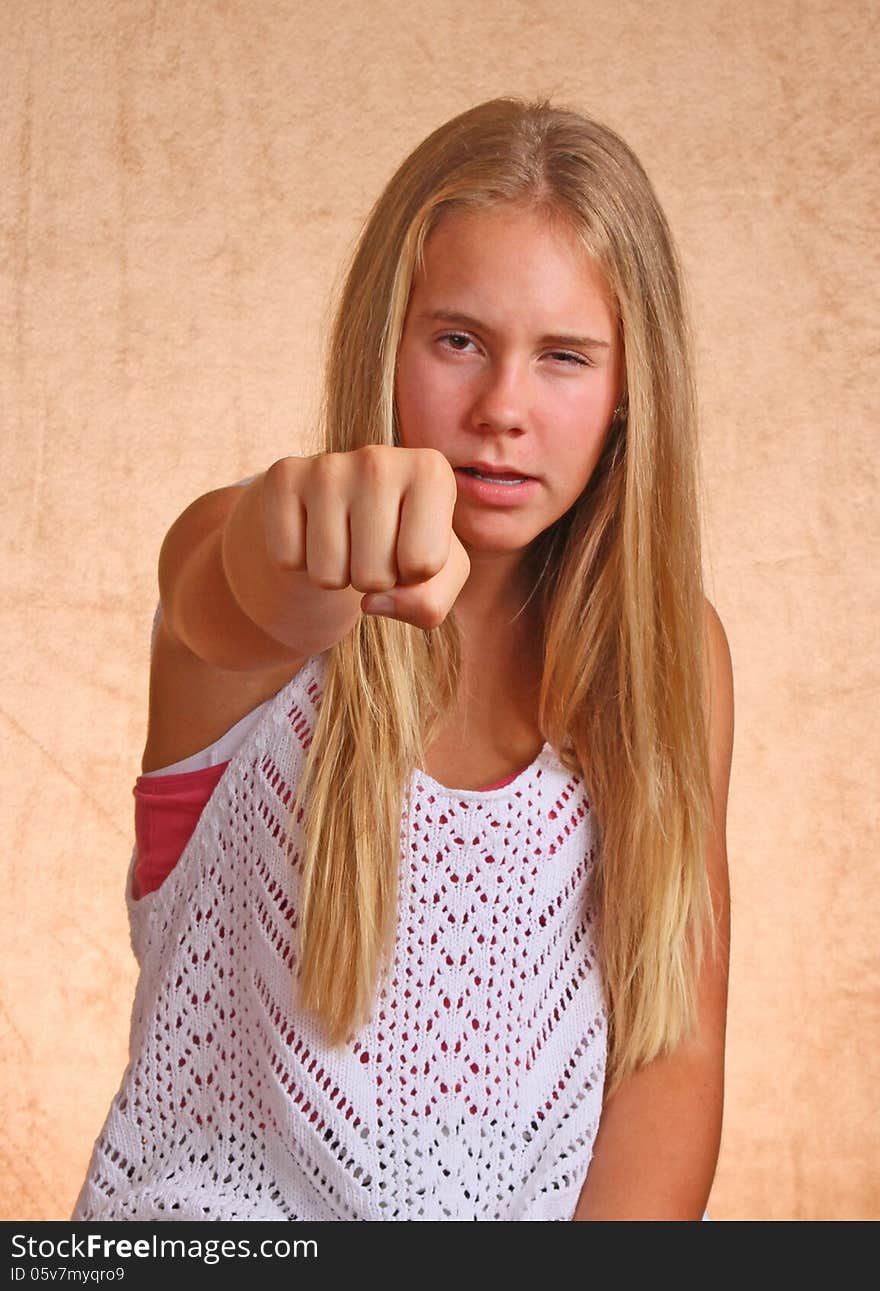 Young Girl With Angry Fist