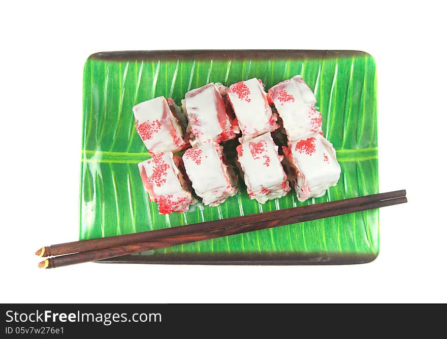 Rolls on a plate with sticks isolated on a white background