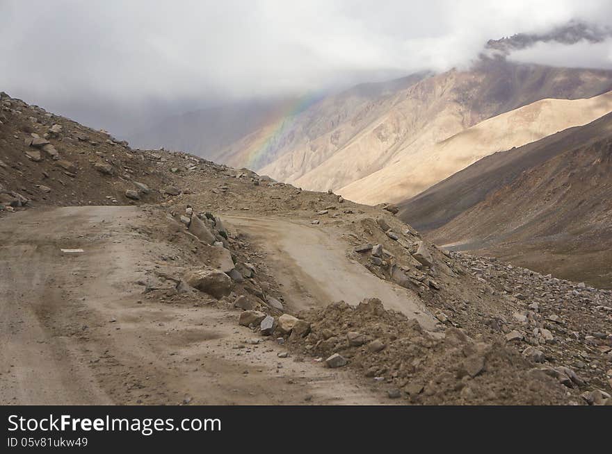 Rainbow over the mountain top in Nubra Valley. Rainbow over the mountain top in Nubra Valley