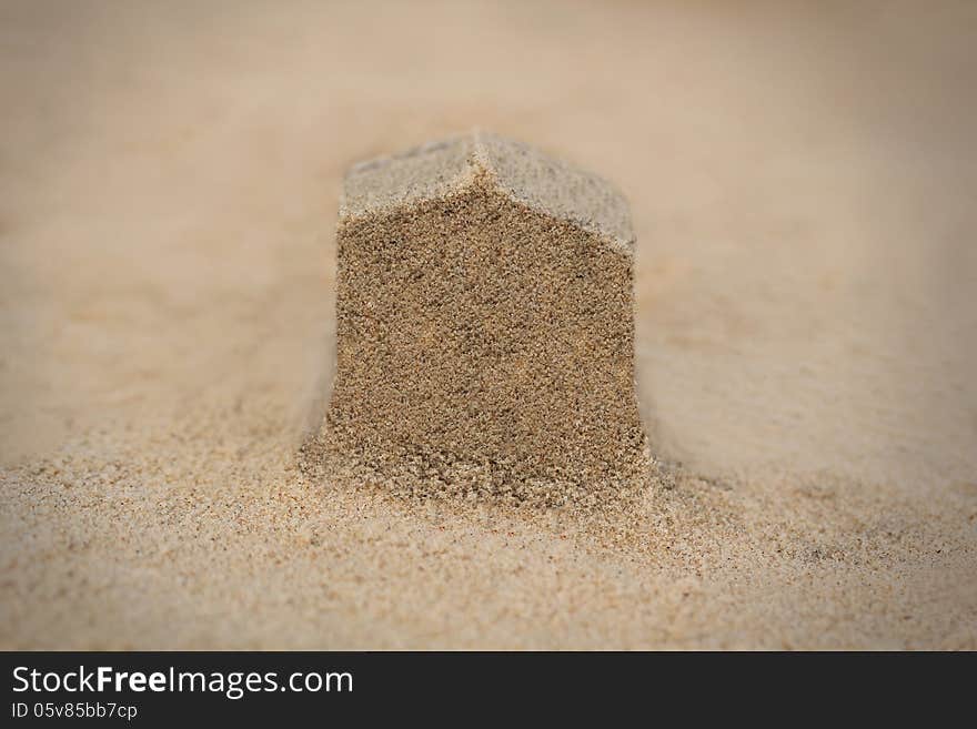 House&x28;home&x29; structure made in beach sand - concept photo.