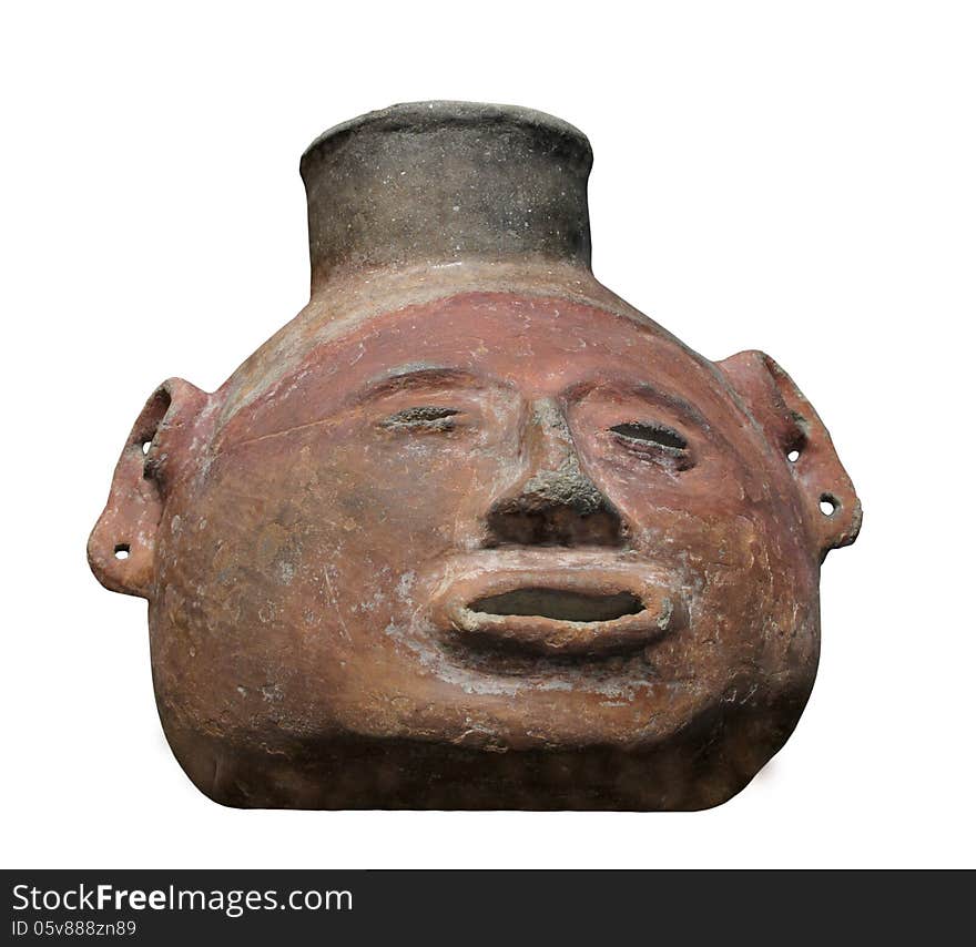 Ancient rustic clay Mayan drinking vessel in the shape of a fat face. Isolated on white. Ancient rustic clay Mayan drinking vessel in the shape of a fat face. Isolated on white.