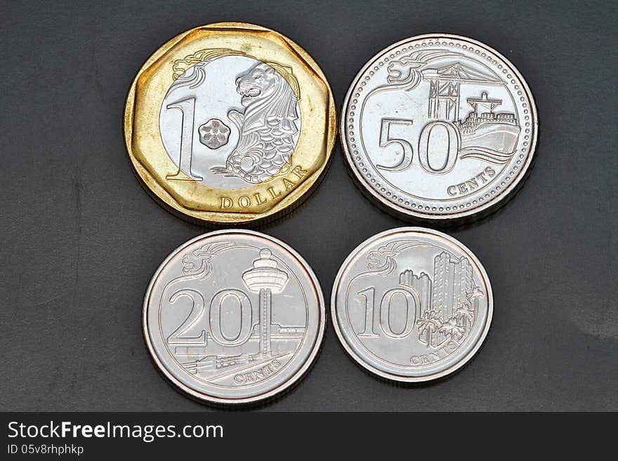 The new Singapore coins (Bi-metallic dollar and others, only lacking the new 5 cents coin). The new Singapore coins (Bi-metallic dollar and others, only lacking the new 5 cents coin)