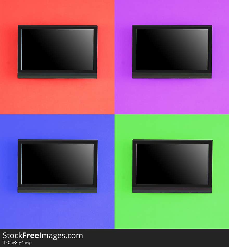 Set of modern LED screen on color wall