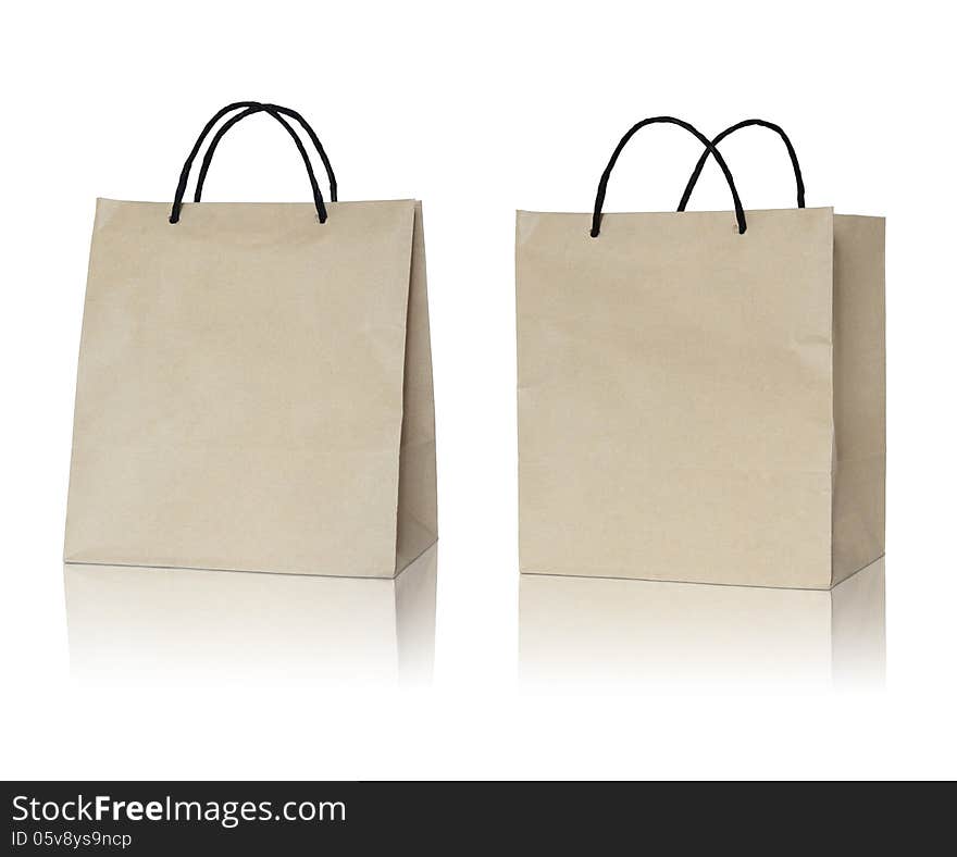 Brown paper bag on reflect floor and white background. Brown paper bag on reflect floor and white background