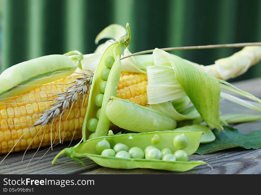 Abstract still life with green peas, corn and wheat. Abstract still life with green peas, corn and wheat.