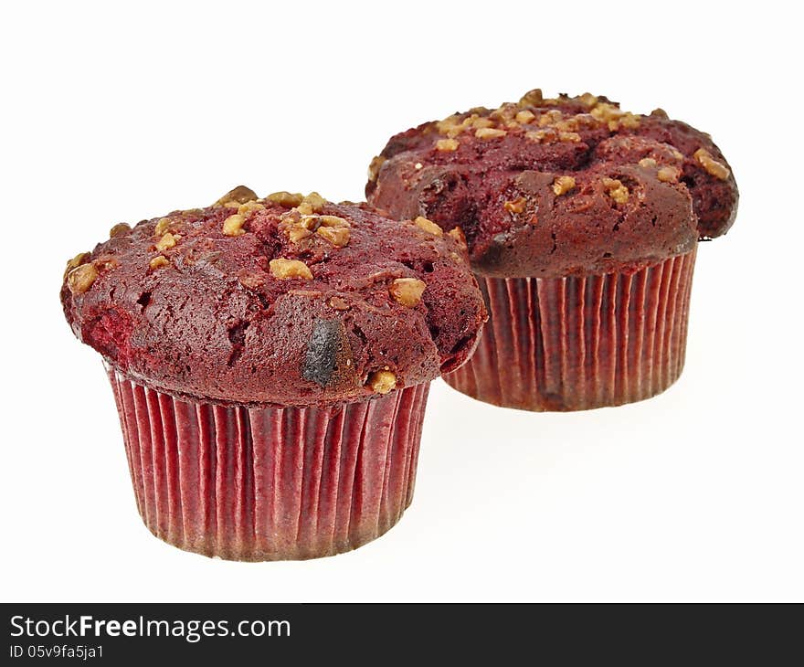 Two red almond muffin cake on white background. Two red almond muffin cake on white background