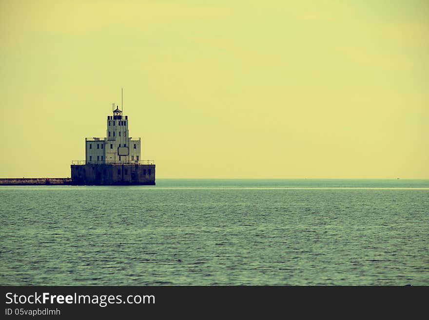 Old building of lighthouse on Lake Michigan