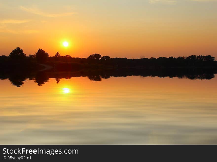 Dramatic sunset over the lake