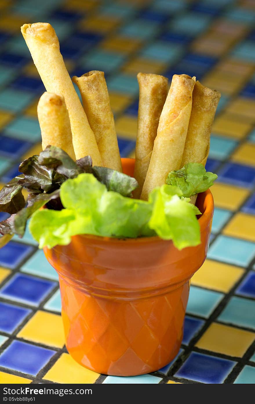 Deep Fried shrimp rolls on the mosaic