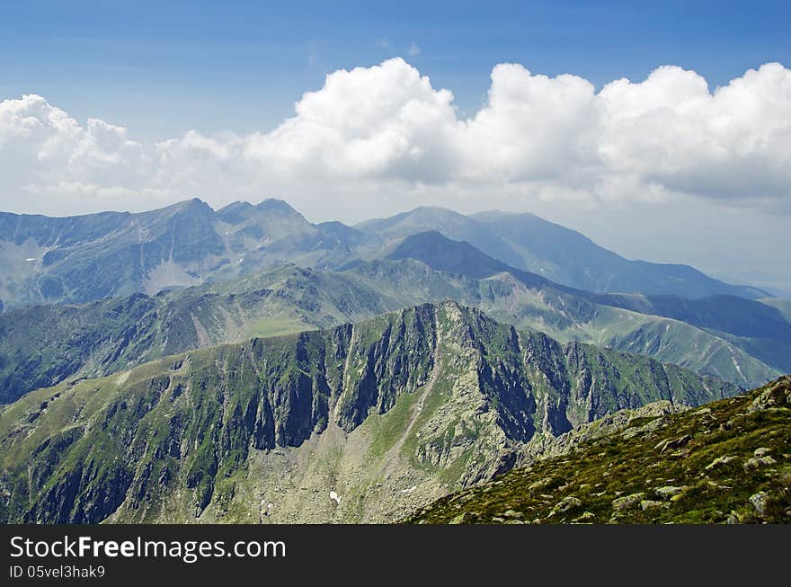 Over the clouds - view from Mount Negoiu, Fagaras Mouintains, second highest peak in Romania. Over the clouds - view from Mount Negoiu, Fagaras Mouintains, second highest peak in Romania.