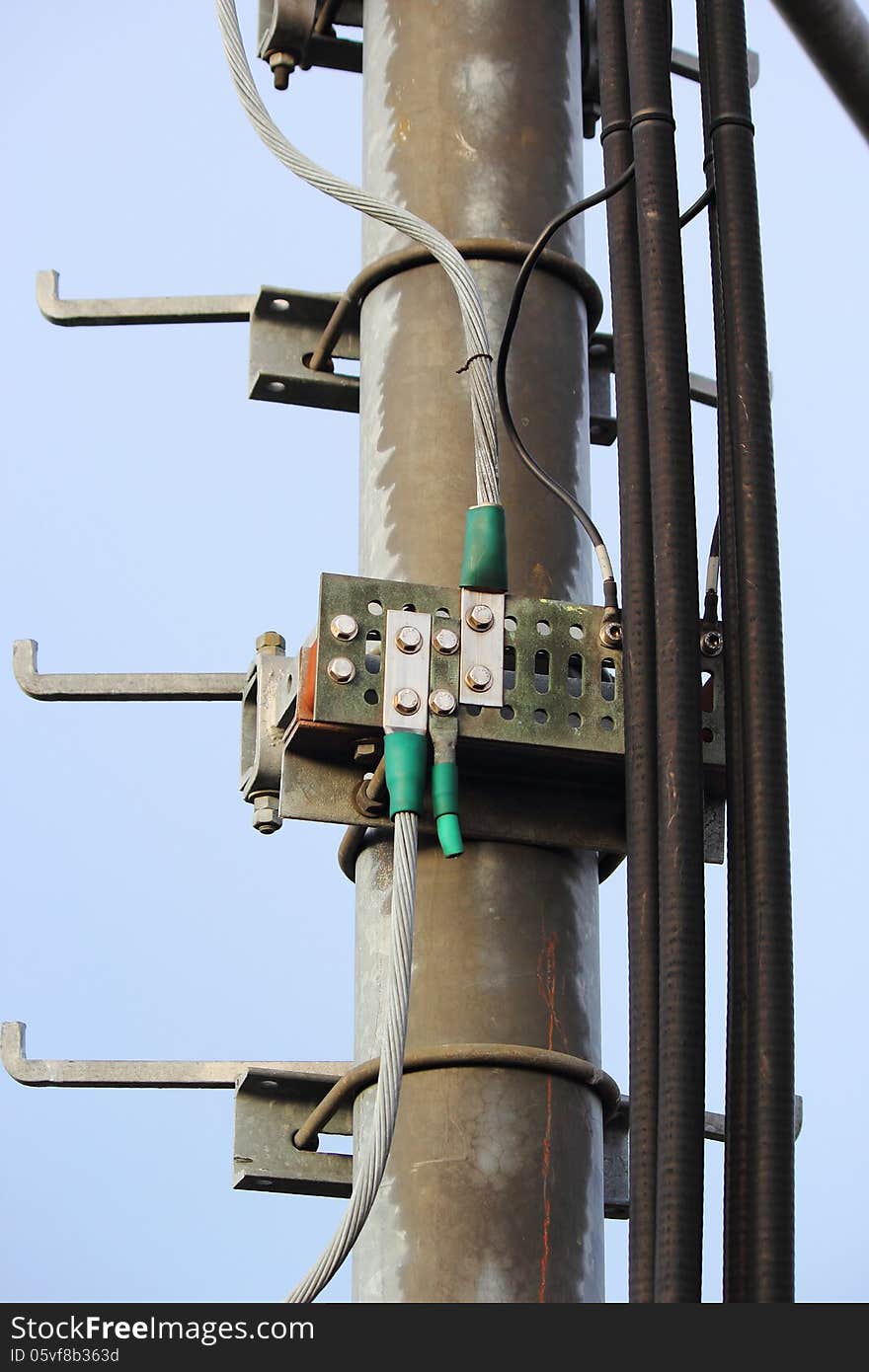 Grounding Point Cable on telephone poles. Grounding Point Cable on telephone poles.