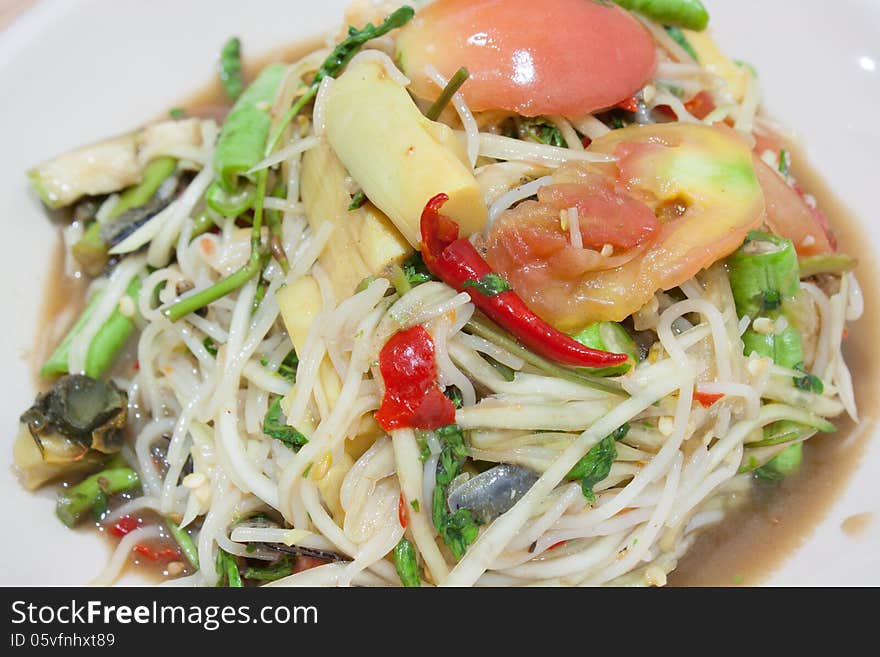 Papaya salad (Som Tum) is a local Thai food