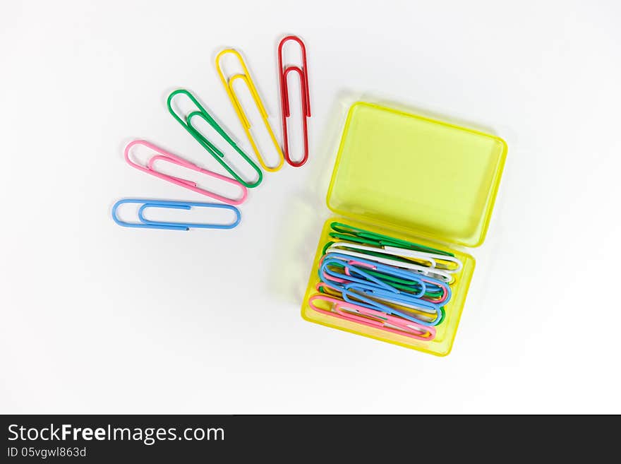 Box and paperclip on the white background. Box and paperclip on the white background