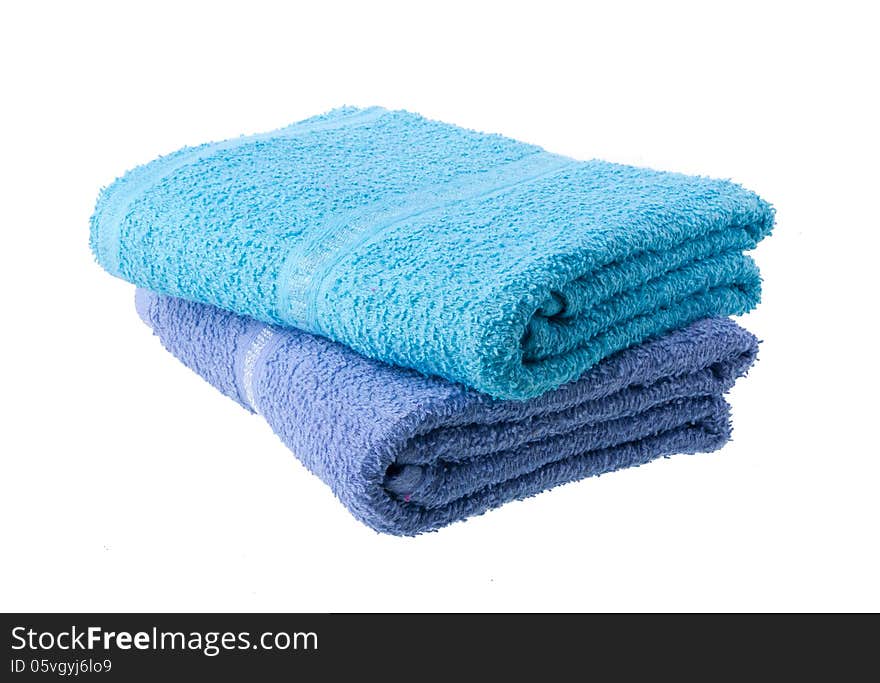 Colorful towels isolated on white background