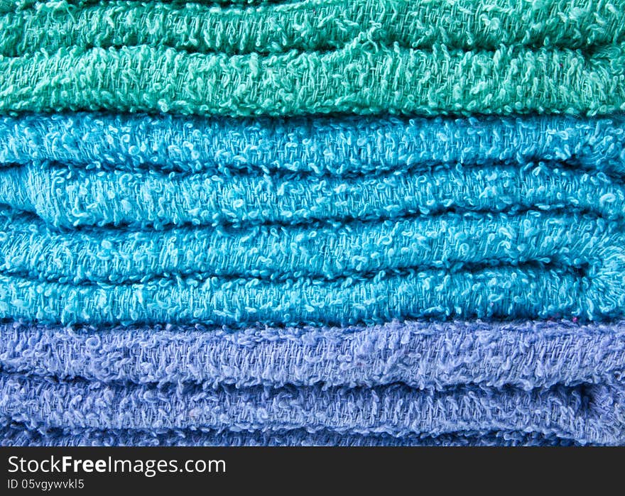 Colorful towels isolated on white background