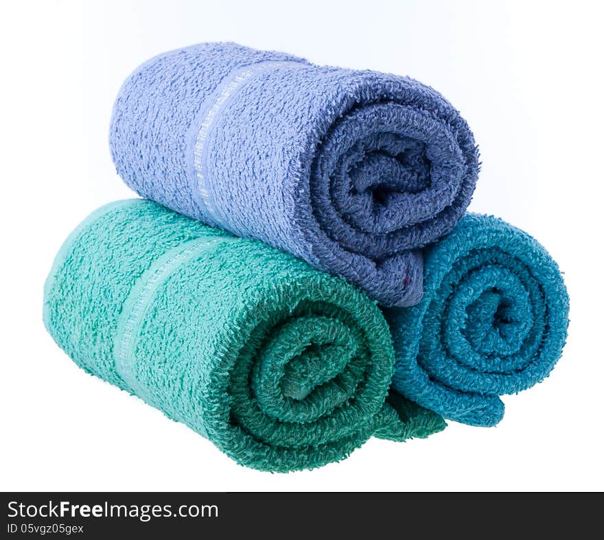 Colorful towels isolated on white background