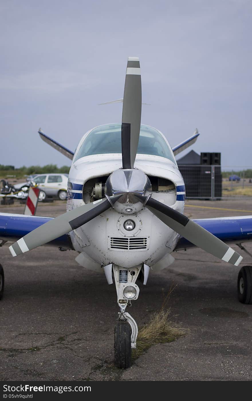 Front part of fuselage of a small light aircraft in full color. Front part of fuselage of a small light aircraft in full color